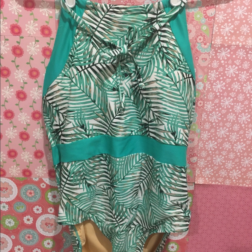 Halter style turquoise and cream swimsuit